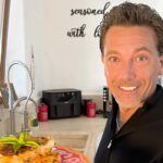Gino D’Acampo charges Geordies more for identical Christmas Day menu with Newcastle diners paying 150 pounds compared to 100 in northern cities and 135 in London sparking customer confusion.