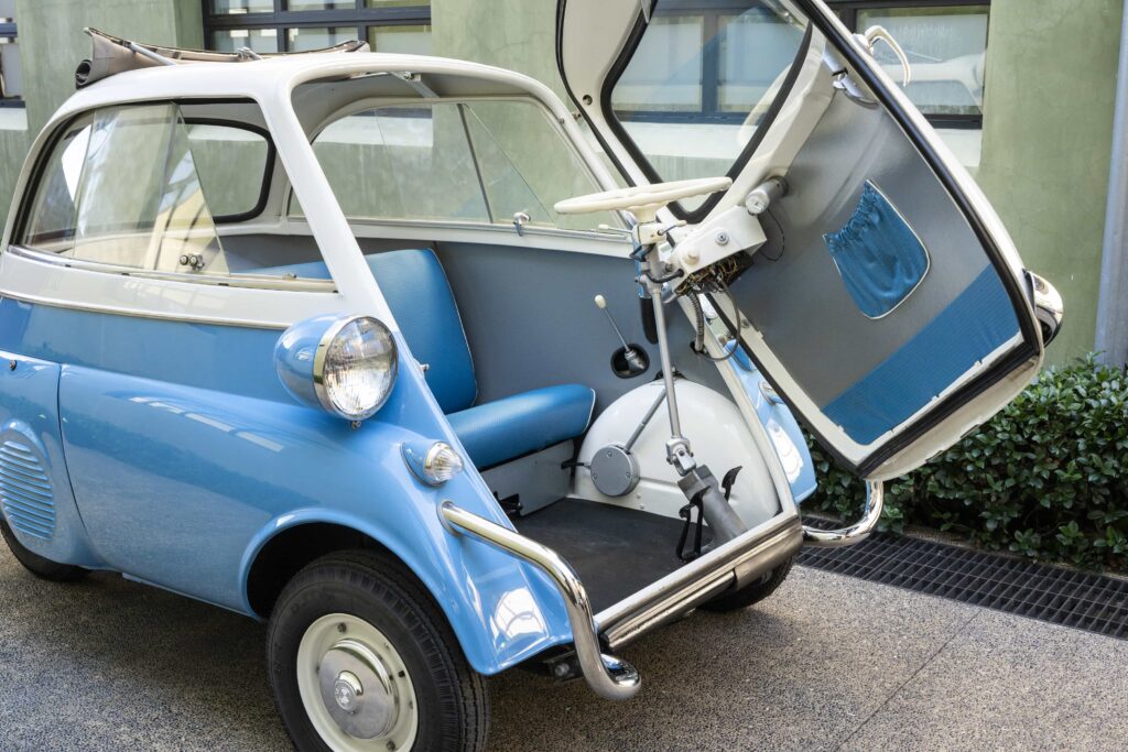 A charming 1957 BMW Isetta 300 microcar expected at 22000 pounds offers restored blue and white style 53mph top speed and classic appeal ahead of its RM Sotheby’s auction today.