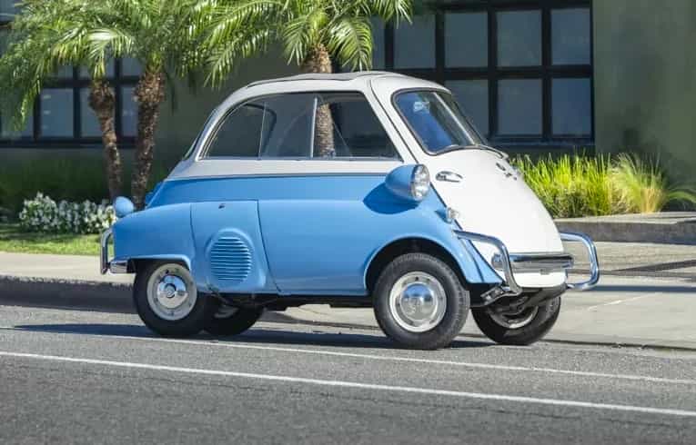 A charming 1957 BMW Isetta 300 microcar expected at 22000 pounds offers restored blue and white style 53mph top speed and classic appeal ahead of its RM Sotheby’s auction today.