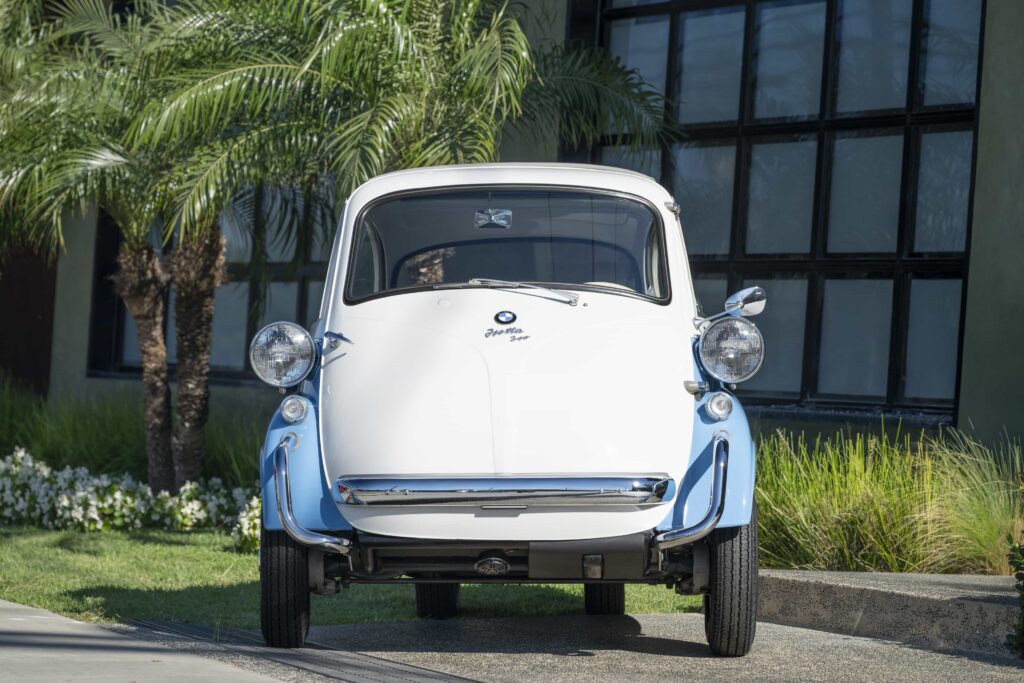 A charming 1957 BMW Isetta 300 microcar expected at 22000 pounds offers restored blue and white style 53mph top speed and classic appeal ahead of its RM Sotheby’s auction today.