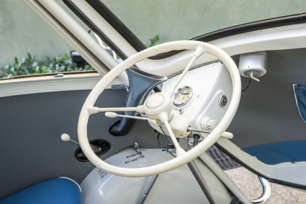 A charming 1957 BMW Isetta 300 microcar expected at 22000 pounds offers restored blue and white style 53mph top speed and classic appeal ahead of its RM Sotheby’s auction today.