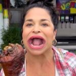 Former world record holder for largest mouth shocks fans by eating a whole pie in one bite. TikTok star with 3.8m followers turns her once-mocked feature into a superpower.