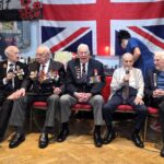 Five World War II veterans with a combined age of 505 formed the world’s oldest boy band after singing Vera Lynn’s We’ll Meet Again at a Remembrance lunch in Essex.