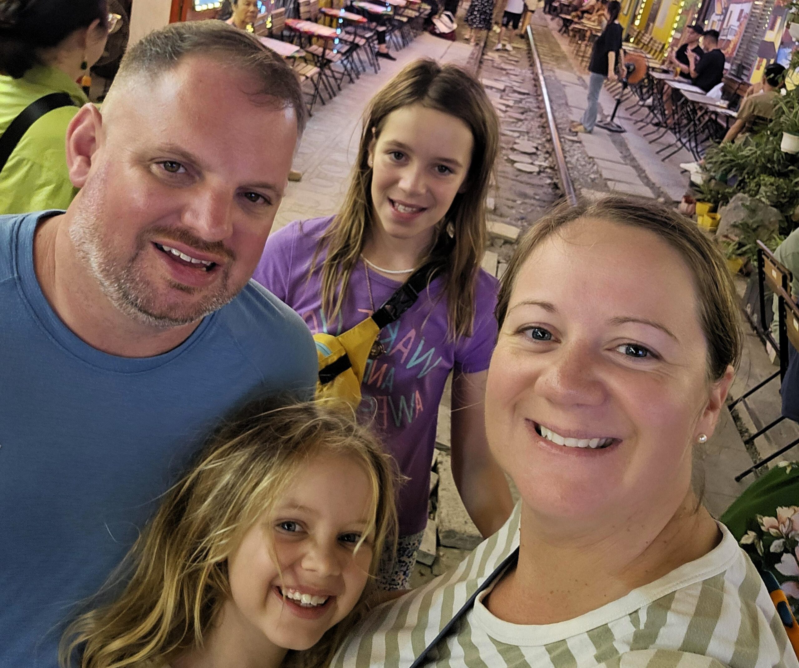 UK couple ditch hamster wheel life to world school their daughters travelling full time across the globe and discovering cheaper living happier days and freedom as a family.