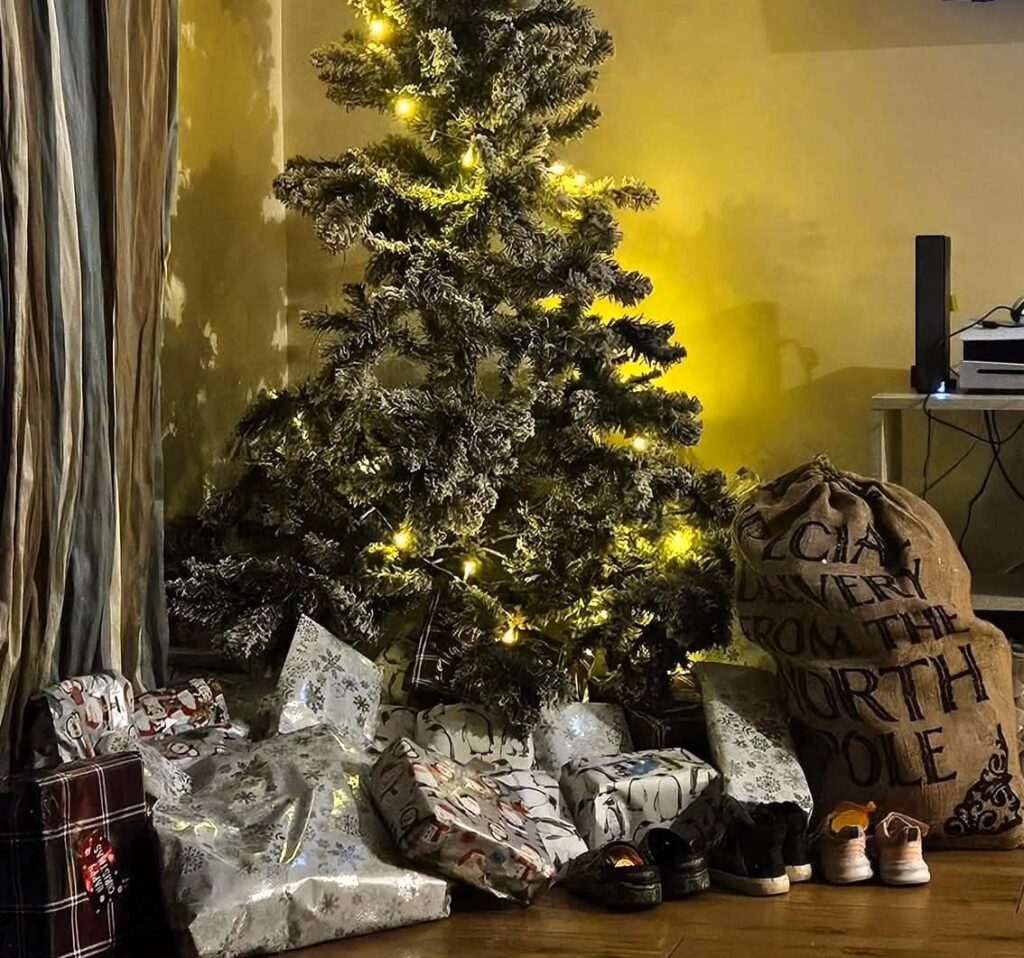 Thrifty mum keeps Christmas under £100 for three kids despite online trolls calling her stingy as she proves smart budgeting second hand finds and simple festive joy truly work.