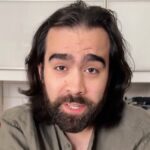 American in the UK sparks outrage after eating a Terrys Chocolate Orange whole then issues a playful apology as Brits teach him the proper way to tap unwrap and enjoy the festive classic.