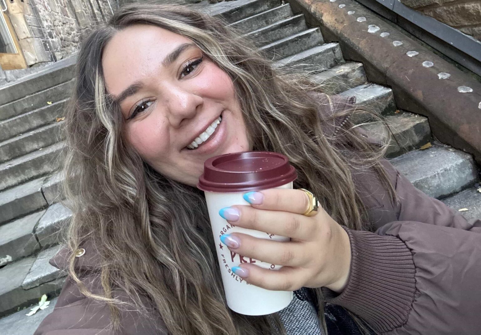 An American tourist goes viral after embarrassing culture slip ups in Scotland from asking about air con to hat etiquette yet falls in love with Edinburgh Glasgow and the people.