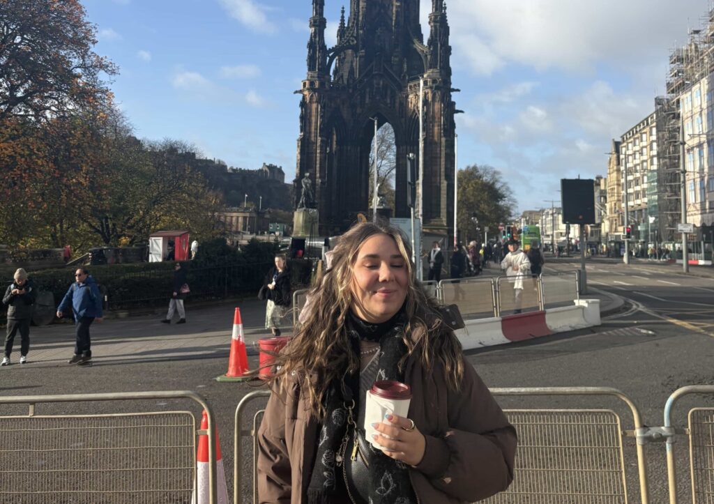 An American tourist goes viral after embarrassing culture slip ups in Scotland from asking about air con to hat etiquette yet falls in love with Edinburgh Glasgow and the people.