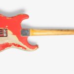 Gary Moore’s heavily played 1961 pink Fender Stratocaster sold for £254400 at Bonhams after decades of studio use tours and iconic performances cementing its status as a rock history treasure.