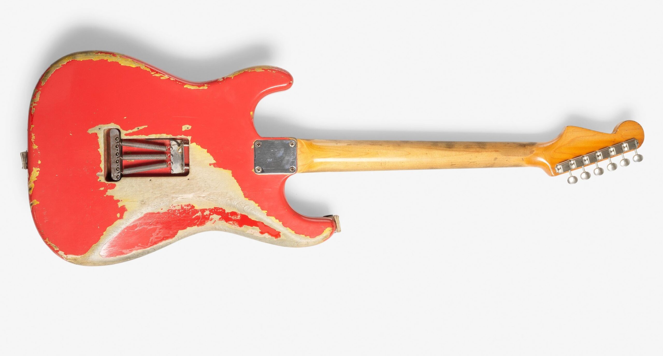 Gary Moore’s heavily played 1961 pink Fender Stratocaster sold for £254400 at Bonhams after decades of studio use tours and iconic performances cementing its status as a rock history treasure.