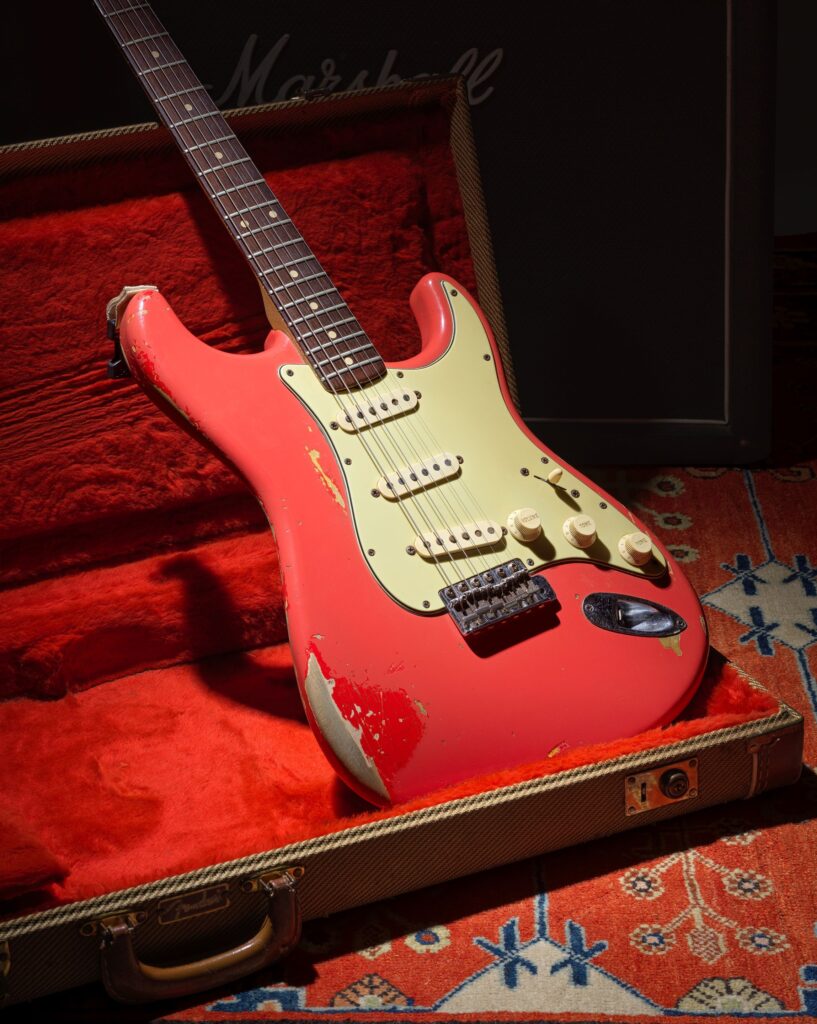 Gary Moore’s heavily played 1961 pink Fender Stratocaster sold for £254400 at Bonhams after decades of studio use tours and iconic performances cementing its status as a rock history treasure.