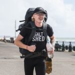 Teen runner Kyle Matthews tackles a marathon a day to run the UK perimeter battling loneliness injury and mental strain while raising money and pushing his resilience to the limit.