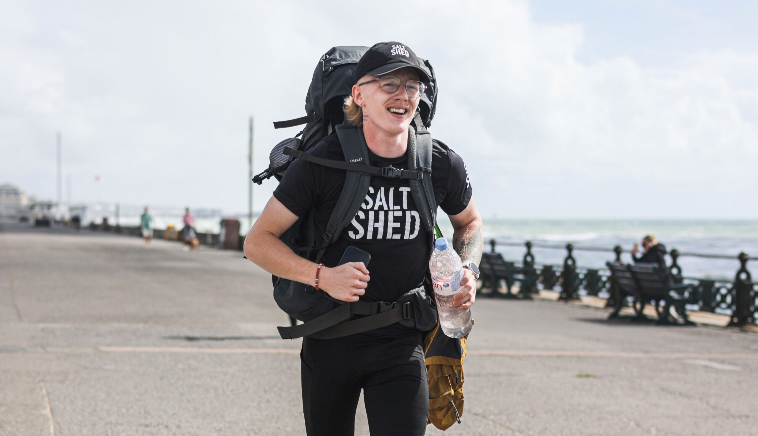 Teen runner Kyle Matthews tackles a marathon a day to run the UK perimeter battling loneliness injury and mental strain while raising money and pushing his resilience to the limit.