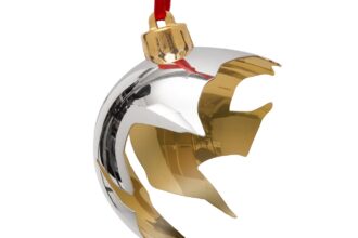 The £495 cracked Christmas bauble designed to look like a cat smashed it off the tree has stunned shoppers yet is nearly sold out as a luxury festive decoration online now.