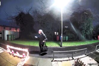 Motion sensor Santa makes elderly woman jump in viral doorbell clip as a family in Stirling bursts into laughter over their decades old dancing Christmas decoration surprising passersby.