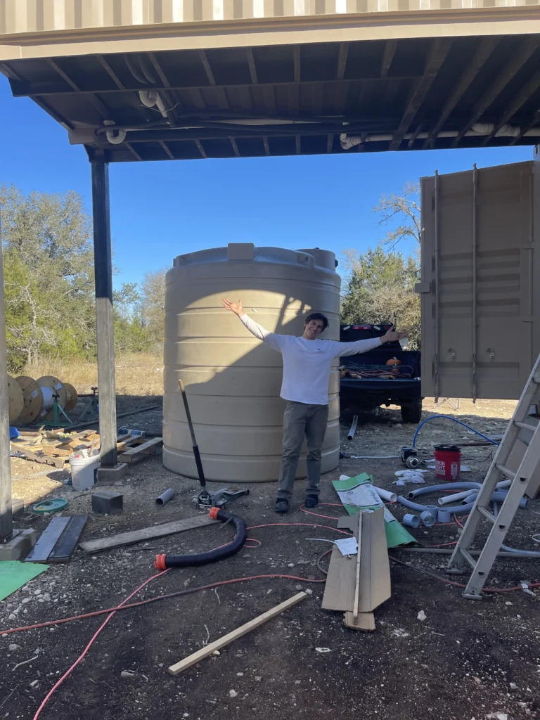 Influencer reveals stunning shipping container home with spiral staircase rooftop deck and sunrise views as couple turn $180k build into cosy sustainable dream Airbnb.