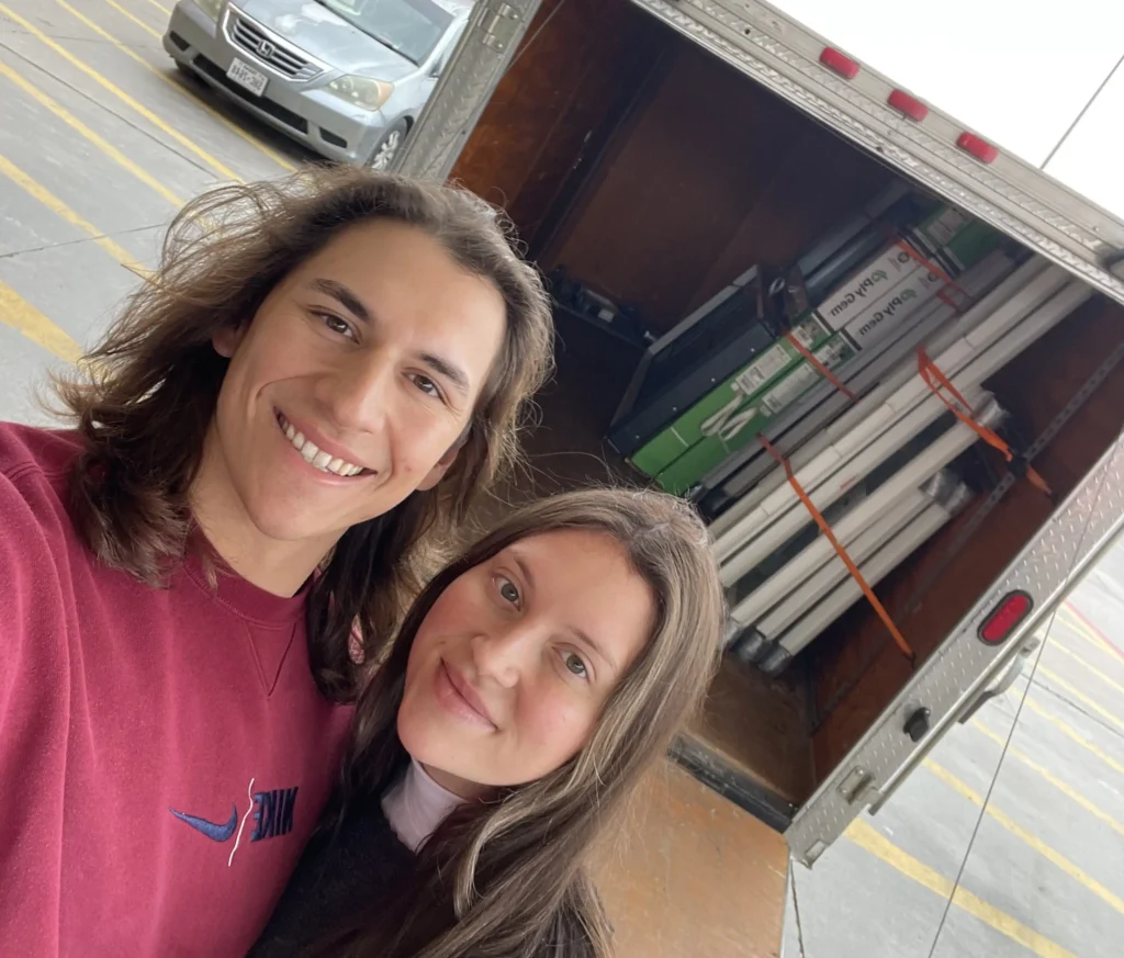 Influencer reveals stunning shipping container home with spiral staircase rooftop deck and sunrise views as couple turn $180k build into cosy sustainable dream Airbnb.