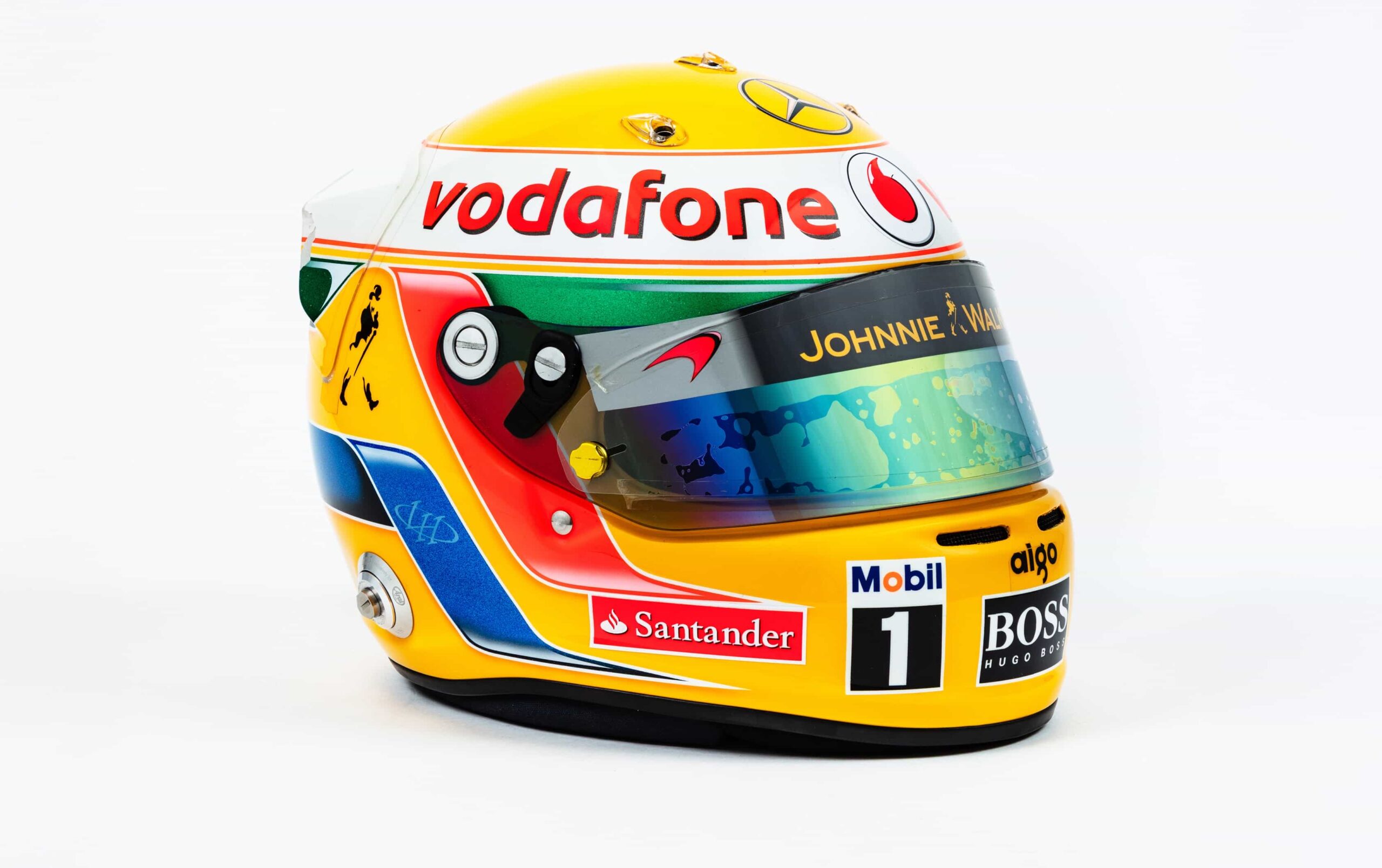 Lewis Hamilton’s rare McLaren Mercedes helmet heads to auction for £105,000, giving fans a unique chance to own iconic F1 history inspired by Ayrton Senna.