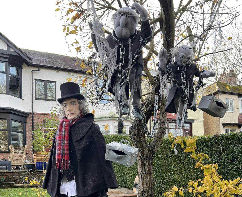 A woman creates a magical Muppets Christmas Carol garden display for just 100 pounds featuring handmade 3D characters that delight neighbours and captivate children throughout the festive season.