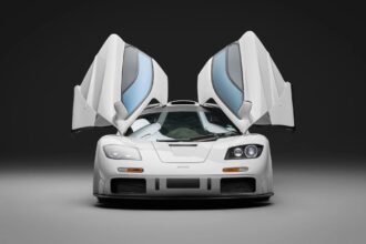 McLaren F1 once owned by Brunei royalty sells for £19m-record price-high downforce upgrades-signatures from Schumacher and Hamilton-makes history as 13th most expensive car ever.