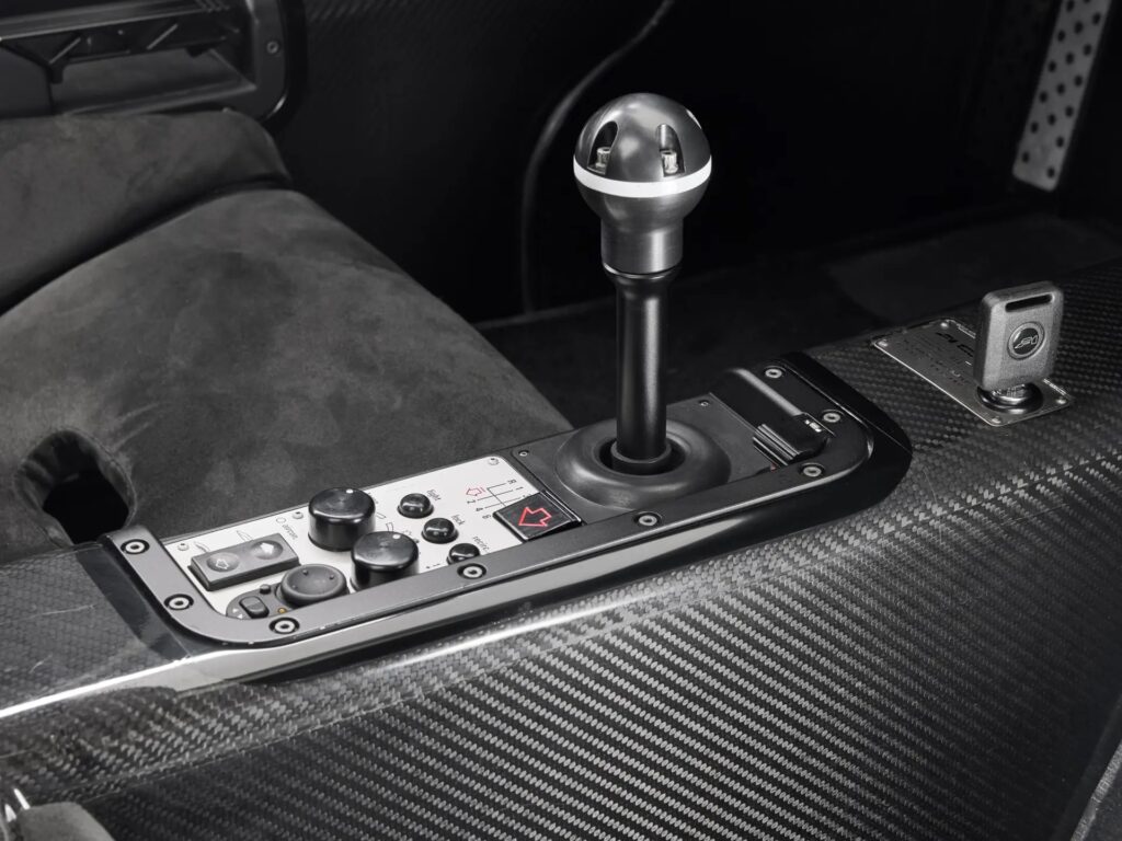 McLaren F1 once owned by Brunei royalty sells for £19m-record price-high downforce upgrades-signatures from Schumacher and Hamilton-makes history as 13th most expensive car ever.