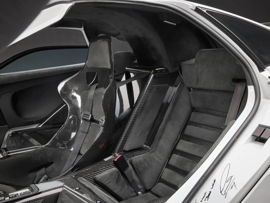 McLaren F1 once owned by Brunei royalty sells for £19m-record price-high downforce upgrades-signatures from Schumacher and Hamilton-makes history as 13th most expensive car ever.