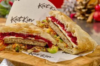 A Michelin trained chef unveils a strange festive cat food Christmas sandwich using “human quality” turkey from KatKin but its overpowering smell makes it nearly impossible to eat.