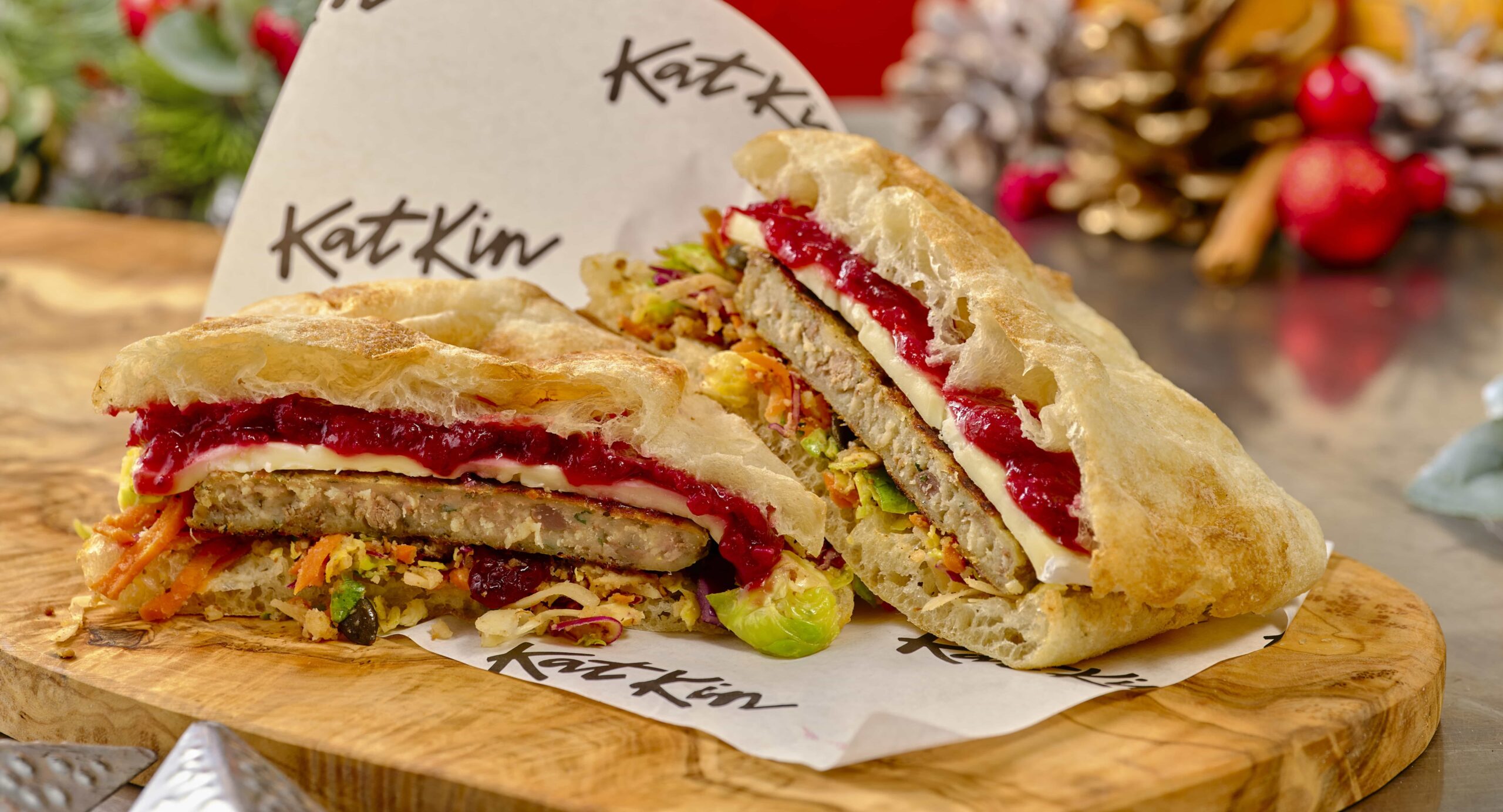 A Michelin trained chef unveils a strange festive cat food Christmas sandwich using “human quality” turkey from KatKin but its overpowering smell makes it nearly impossible to eat.