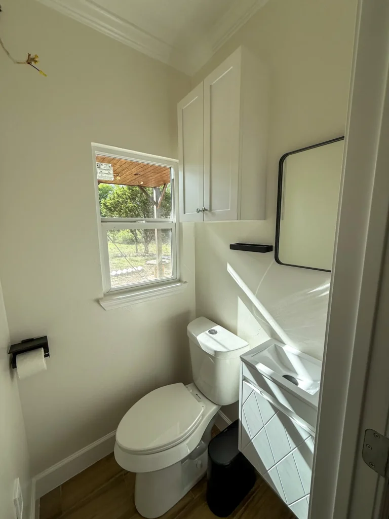 A couple built a 624 sq ft shipping container home on 12.5 Texas acres for far less than traditional housing, with monthly bills of just £440 including water generated from air.