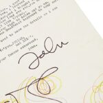 Rare 1974 typed letter from John Lennon to ex wife Cynthia sells for £18,000 featuring his signature doodle as he asks about summer plans with son Julian after their divorce.