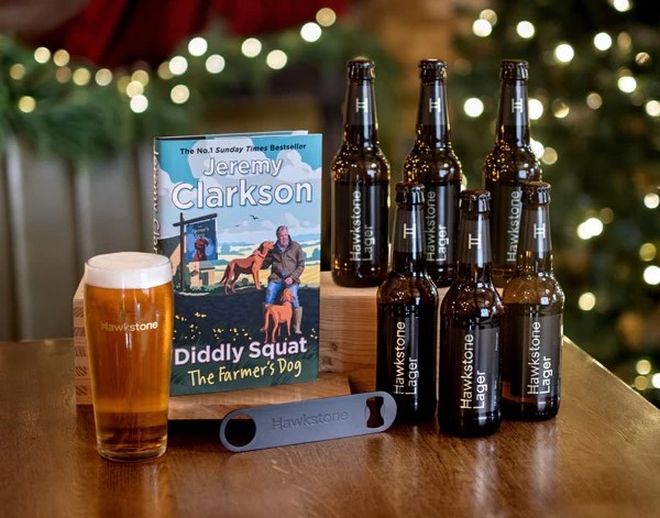 Jeremy Clarkson launches a £50 Merry Sixmas Christmas beer bundle that includes lager, gifts and a book, but shoppers save just 50p compared to buying items separately.