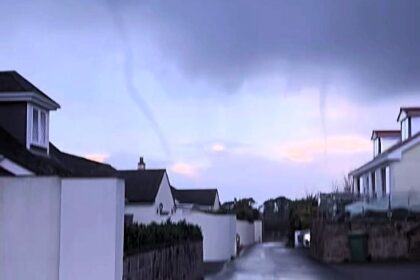 Jersey residents were stunned by a swirling cloud funnel that looked like a tornado as a rare weather vortex hovered for an hour before fading without touching the ground.