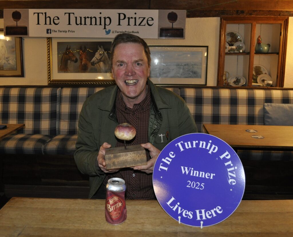 Beer can artwork titled Bitter n Twisted wins the spoof Turnip Prize celebrating the worst art with Ali Can taking home the turnip trophy at the long running Somerset contest.