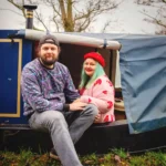 Couple living on a 57ft narrowboat reveal the joys and challenges of moving every two weeks saving money while embracing a cosy peaceful lifestyle that feels like a nonstop holiday even at Christmas.
