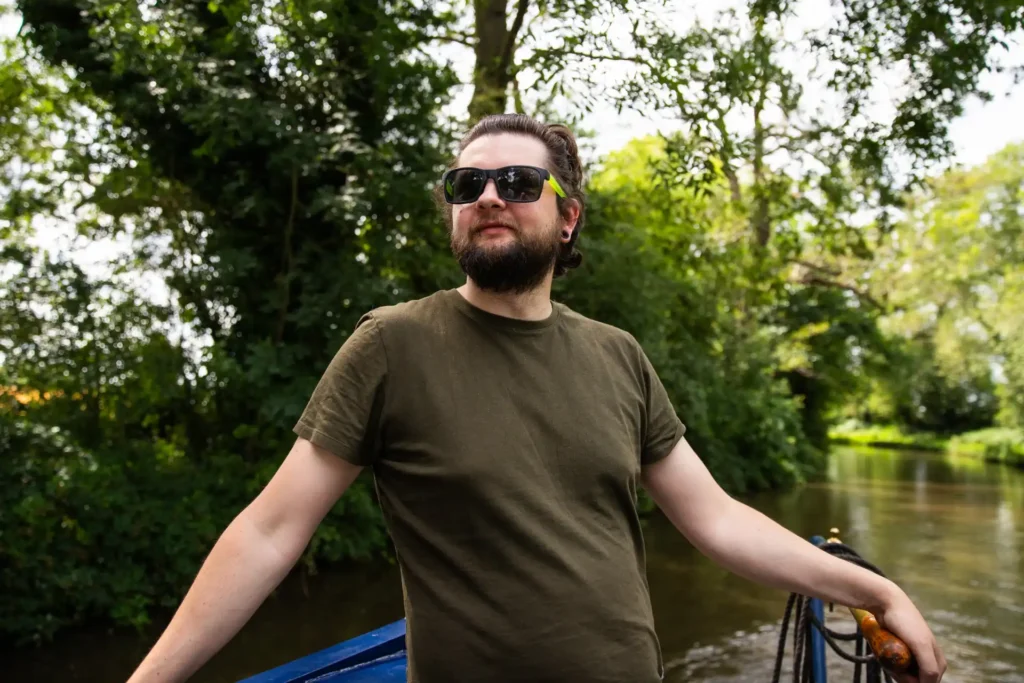 Couple living on a 57ft narrowboat reveal the joys and challenges of moving every two weeks saving money while embracing a cosy peaceful lifestyle that feels like a nonstop holiday even at Christmas.
