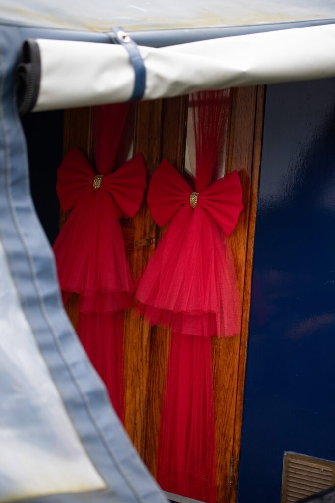 Couple living on a 57ft narrowboat reveal the joys and challenges of moving every two weeks saving money while embracing a cosy peaceful lifestyle that feels like a nonstop holiday even at Christmas.