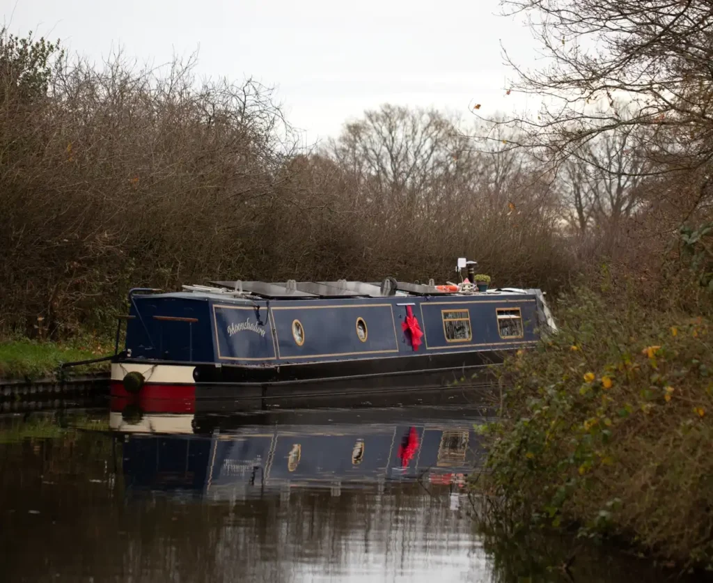 Couple living on a 57ft narrowboat reveal the joys and challenges of moving every two weeks saving money while embracing a cosy peaceful lifestyle that feels like a nonstop holiday even at Christmas.