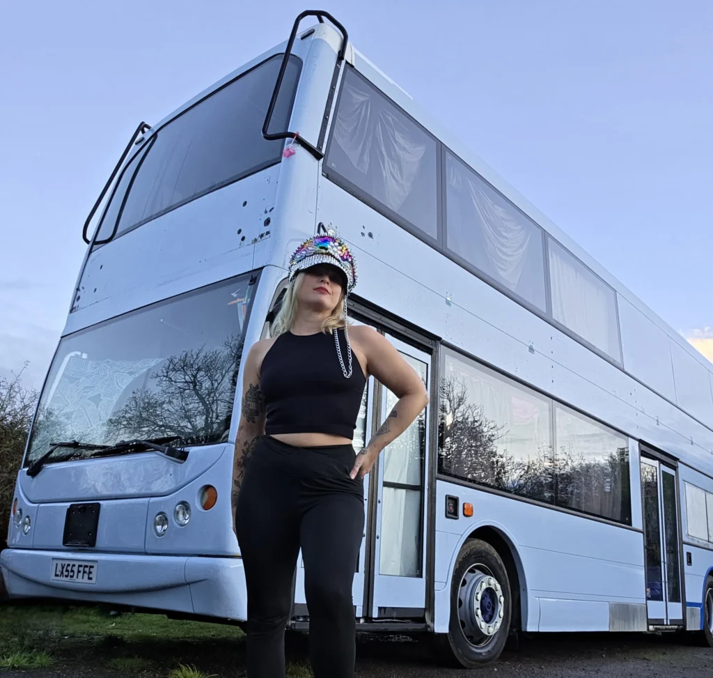 Woman fulfils childhood dream by turning a double decker bus into a home but says living on wheels costs as much as a house with rising insurance fuel and upkeep bills.