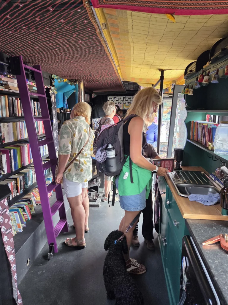 Woman fulfils childhood dream by turning a double decker bus into a home but says living on wheels costs as much as a house with rising insurance fuel and upkeep bills.