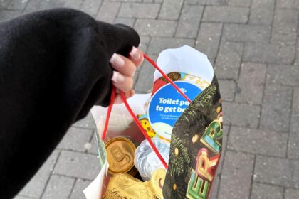 Shopper visits Tesco Christmas market and bags free festive goodies worth up to 20 pounds after spending just 3.50 praising the cute event and generous samples touring UK stores this December.