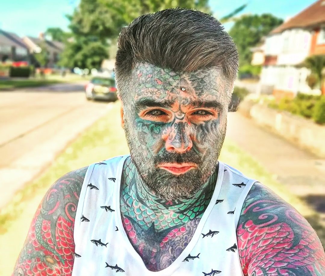 Britain's most tattooed man King of Ink Land celebrates four years without new ink after giving up tattoos to pay off his mortgage, with just £5,000 remaining on his Birmingham home.