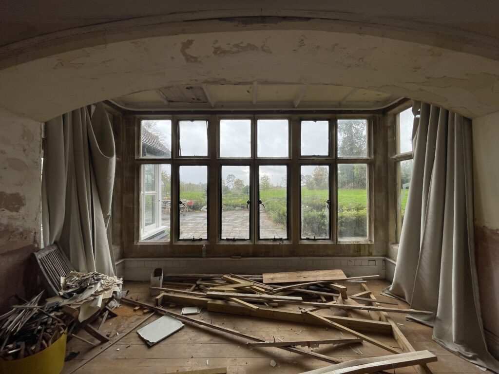Urban explorer discovers £1.4m abandoned mansion in Gloucester with swimming pool, snooker table - renovation halted mid-project, now decaying deep in overgrown woodland.