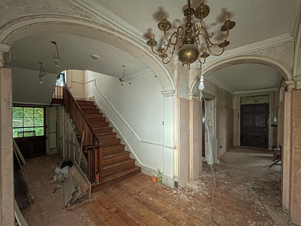Urban explorer discovers £1.4m abandoned mansion in Gloucester with swimming pool, snooker table - renovation halted mid-project, now decaying deep in overgrown woodland.