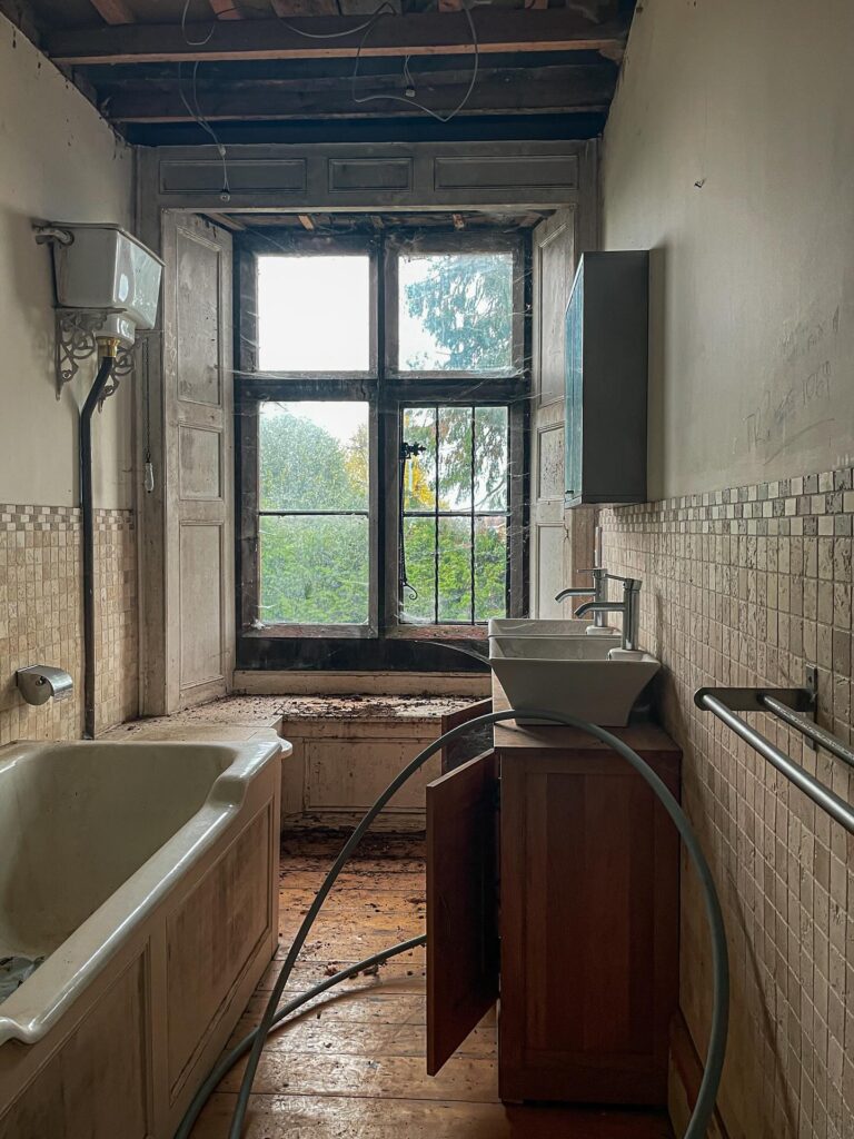 Urban explorer discovers £1.4m abandoned mansion in Gloucester with swimming pool, snooker table - renovation halted mid-project, now decaying deep in overgrown woodland.