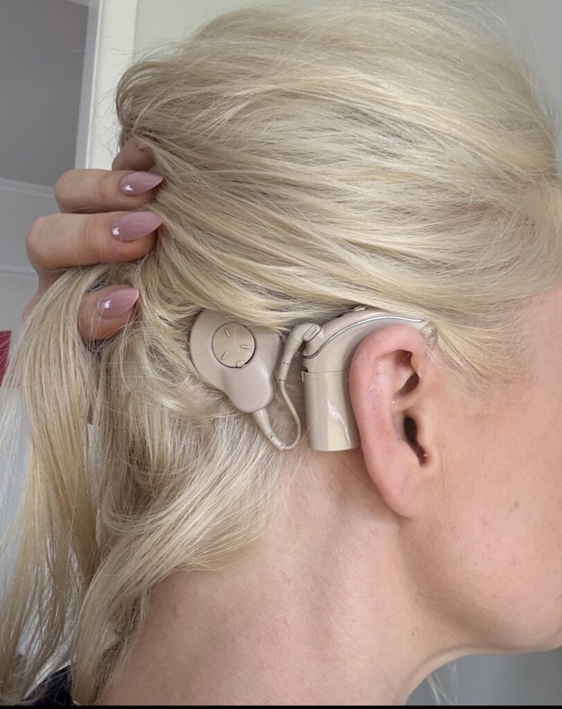 Two deaf friends communicate offline in pool without cochlear implants - viral video with 4.7m views shows Cassandra and Dylan using lip reading and gestures.