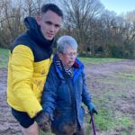 An 81 year old dog walker trapped waist deep in mud was rescued by two runners who rushed from a cafe using bare hands quick thinking and teamwork to save her.