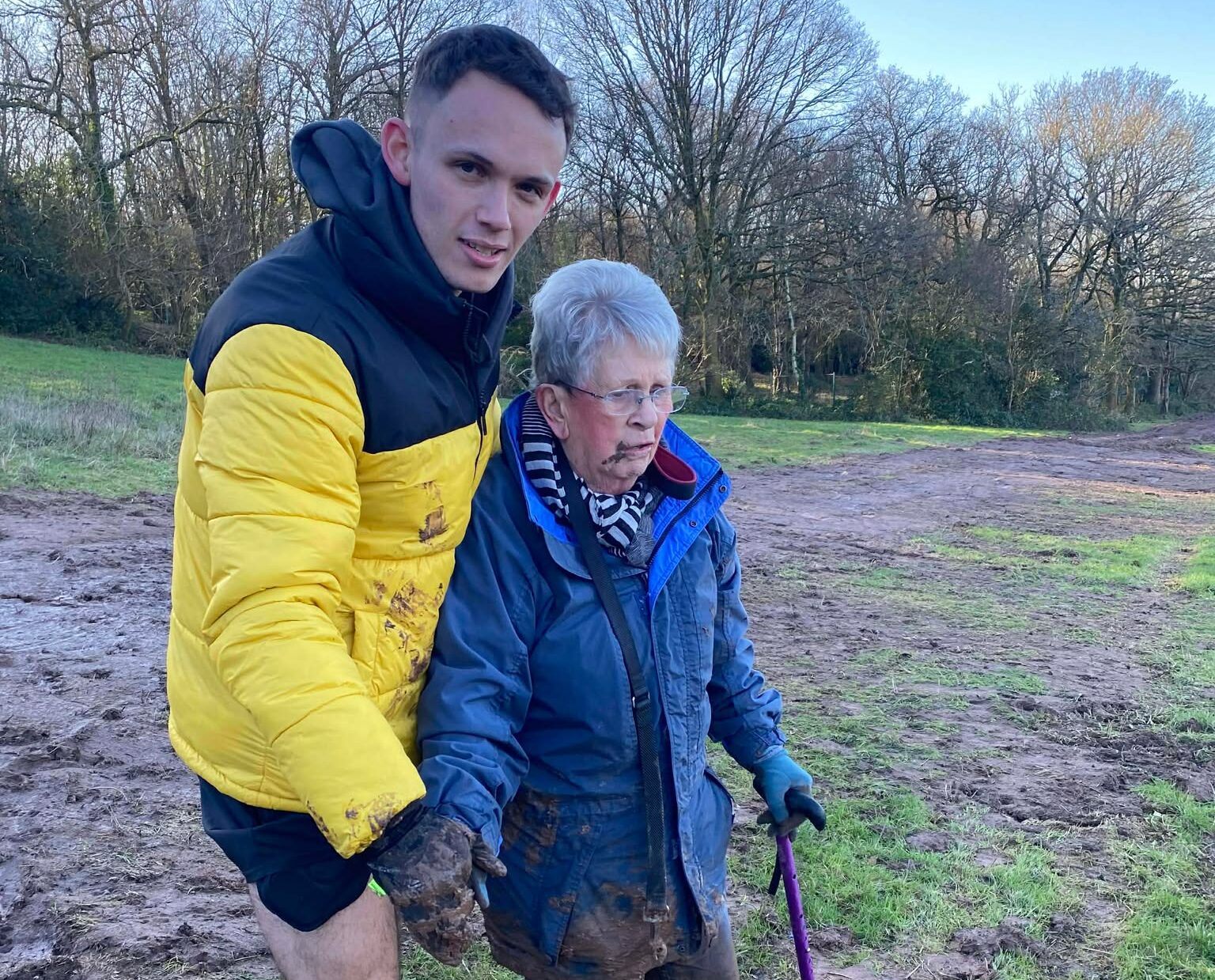 An 81 year old dog walker trapped waist deep in mud was rescued by two runners who rushed from a cafe using bare hands quick thinking and teamwork to save her.