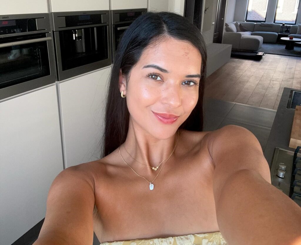 Frustrated passenger Caitlin filmed Schiphol Airport workers having snowball fight on runway during severe flight delays, with viral video gaining 900,000 views.