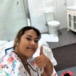 Horrified traveller's budget hotel stay goes viral after filming tiny bed squeezed inches from toilet and shower at Airport Hotel Sydney. Libni Fortuna paid £55.