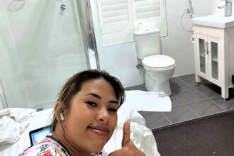 Horrified traveller's budget hotel stay goes viral after filming tiny bed squeezed inches from toilet and shower at Airport Hotel Sydney. Libni Fortuna paid £55.